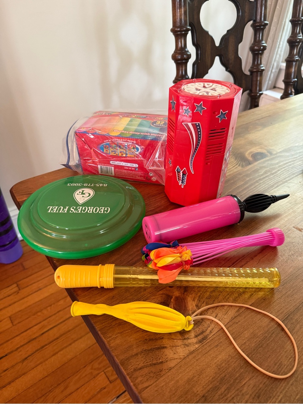 Party Balloon Pump and Assorted Kids Party outdoor Toys - frisbee, chalk etc